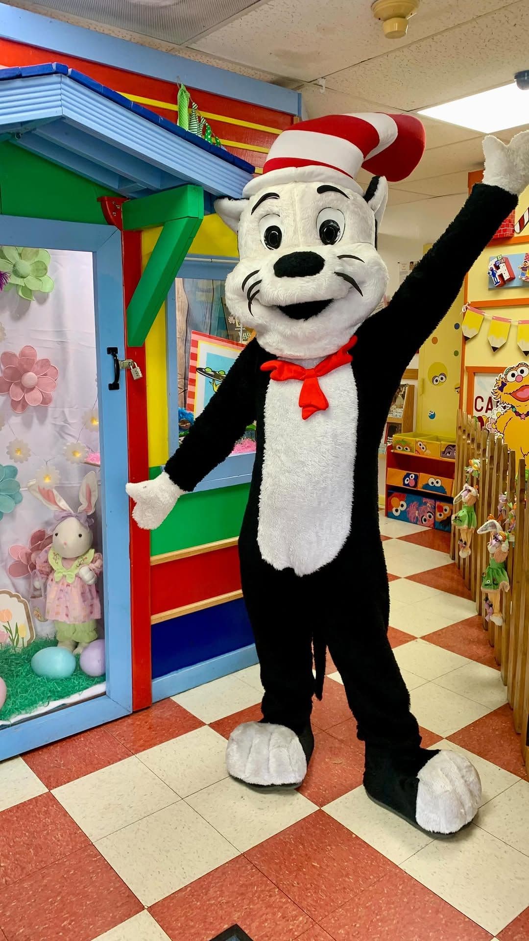 The Cat in the Hat visiting a colorful classroom during Read Across America week.